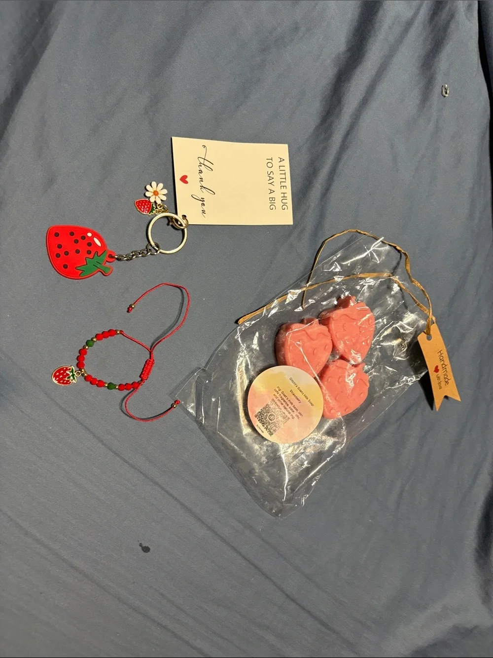 Strawberry Keychain Charm with bracelet and 3 strawberry mini goat milk soaps